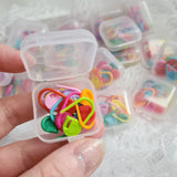 Set of 10 stitch markers in a mini plastic box, free postage.