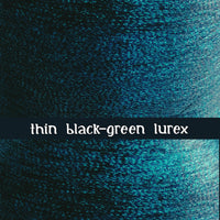 addition of thin black-green lurex thread